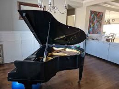 piano-to-the-truck-piano-lift THE A TEAM - Fort Lauderdale Piano Movers